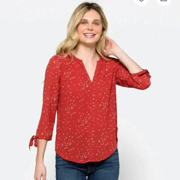 Fun2fun rust colored shirt with a cream colored design size small. - Picture 2 of 11